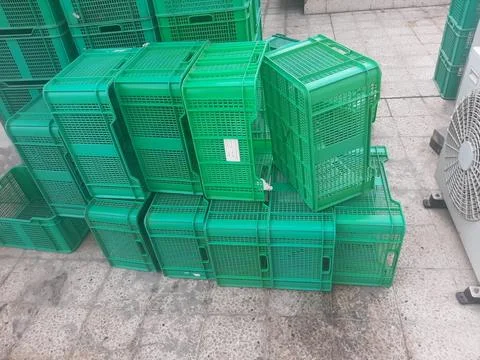 The green empty baskets view on the floor Stock Photos