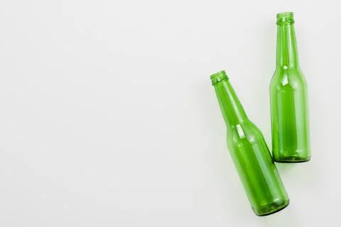 Green empty bottles white background Stock Photos