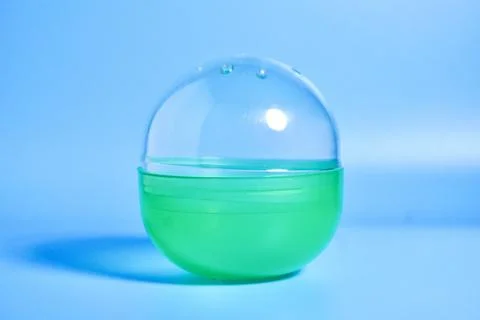 Green empty gacha capsule container Stock Photos