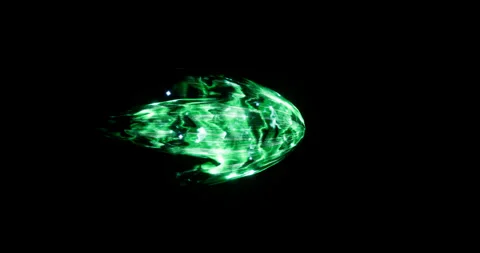 Green energy projectile effect on black background 库存影片 317531935