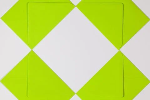 Green  envelopes on the white table Stock Photos