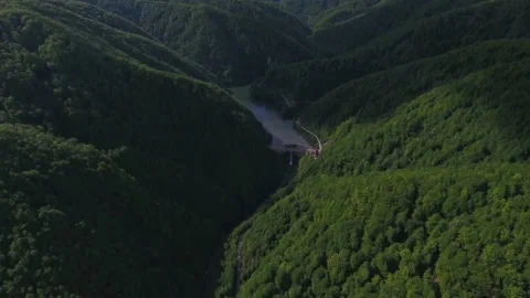 Green environment in the mountains with artificial lake and forest Stock Footage 235125096