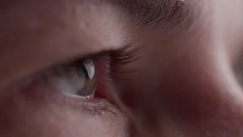 Green eye opening pupil dilating extreme close up. Stock Footage 199473923