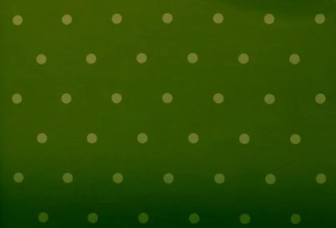 Green fabric and white tiny polka dots background Stock-Fotos