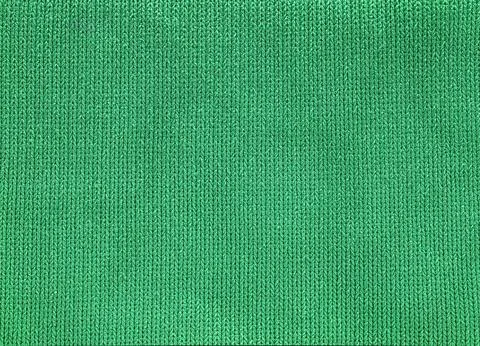A green fabric with a pattern of lines Stock Photos
