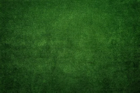 Green fabric texture background with diagonal weave pattern and subtle shad.. Stock Photos