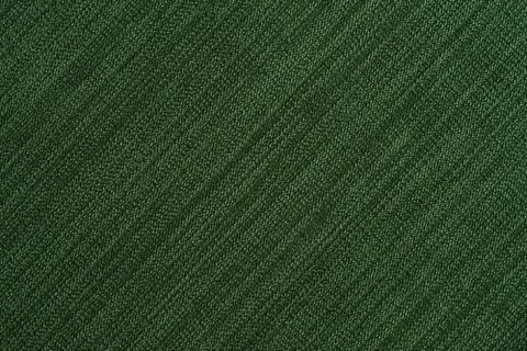 Green fabric texture background. Stock Photos