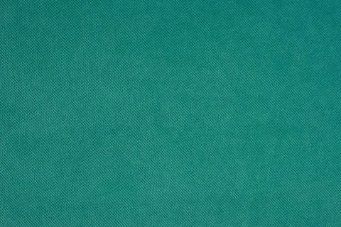 Green fabric texture background. Stock Photos