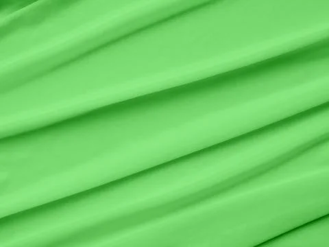 Green fabrick texture background silk cloth abstract emerald pattern Stock Photos
