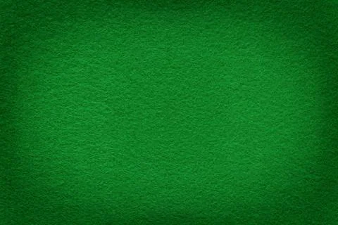 Green felt surface with light copy space in center Foto stock