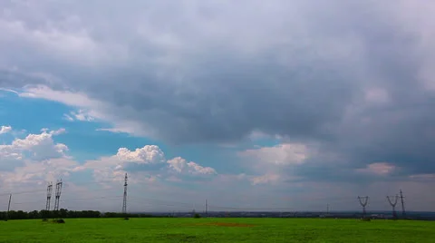 Green field and cloudy sky Stock Footage 24810918