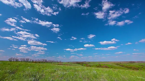 Green field and cloudy sky. 4K. FULL HD, 4096x2304. Stock Footage 36350689