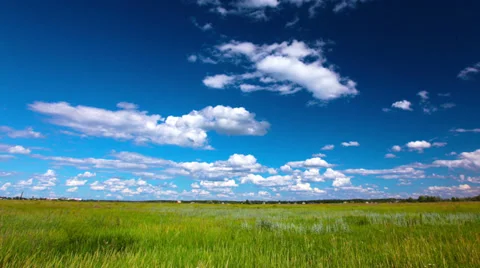 Green field and cloudy sky. 4K. FULL HD, 4096x2304. Stock Footage 39553604