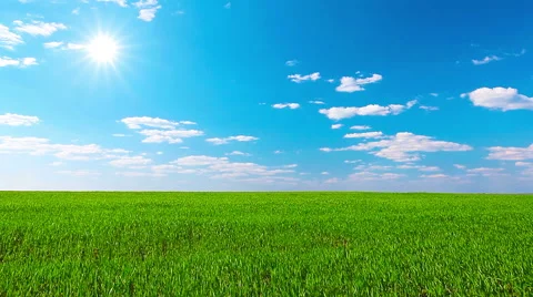 Green field and cloudy sky. timelapse. Stock Footage 40331750