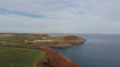 Green field by the Atlantic drone Video stock 106544563