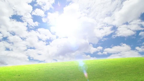 Green field with time lapse of clouds background. Stock-Footage 129665401