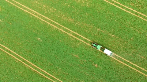 Green field with tractor. 스톡 동영상 74201213