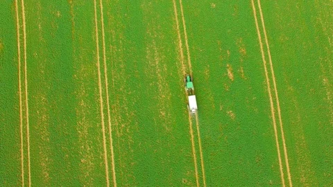 Green field with tractor. Video stock 74201930