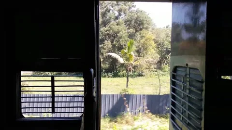 Green fields along with train track 스톡 동영상 155297203