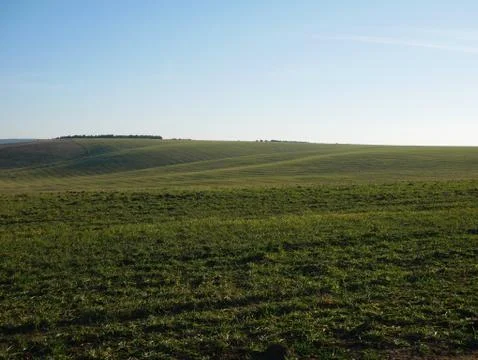 Green fields and mountains real nature Stock Photos