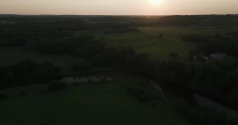 Green Fields And River At Dusk In Oronoco, Minnesota, USA - aerial drone Stock Footage 255606984