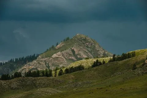 Green fields and slopes of the Altai Mountains Stock Photos