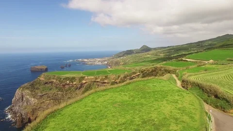 Green fields of Azores with atlantic ocean on background Stock Footage 75331418
