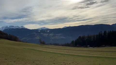 Green fields in front of mountains Stock-Footage 232381844