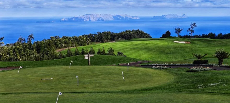 Green fields for golf playing Stock Photos