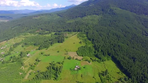 Green fields by the mountain Stock Footage 66657600