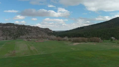Green fields in spring time, Beulah Colorado - slow motion Stock Footage 153606930