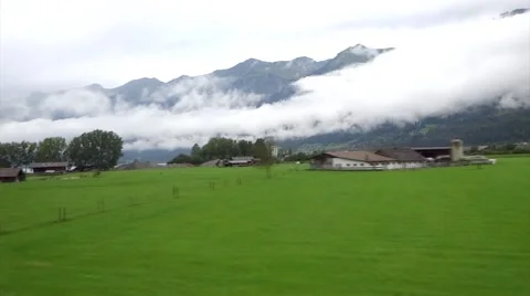 Green fields on the way to Trummelbach Glacial Waterfalls Stock Footage 66054344
