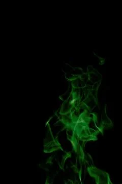 Green fire on black background Stock Photos