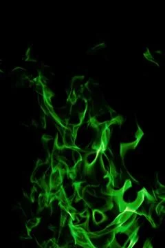 Green fire on black background Stock Photos