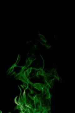 Green fire on black background Stock Photos