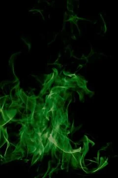 Green fire on black background Stock Photos