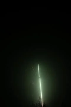 Green Firework in Night Sky Stock Photos