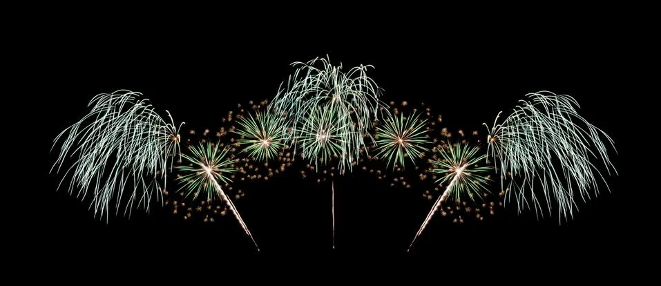 Green fireworks exploding on black sky Stock Photos