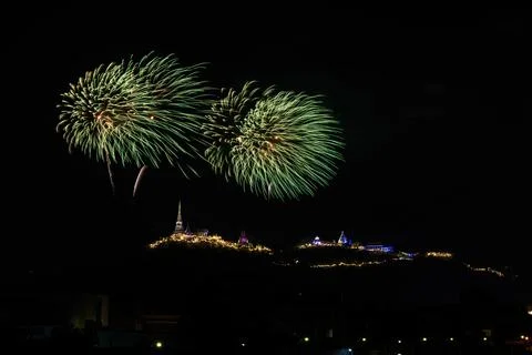 Green Fireworks Exploding Over Illuminated Khao Wang Temple At Night Long E.. Photos