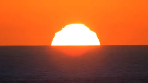 A Green Flash Sunset over the Ocean. Stock Footage 222742236