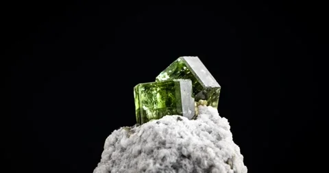 Green Fluorapatite on matrix 360° loop rotating on black background Stock Footage 252754783