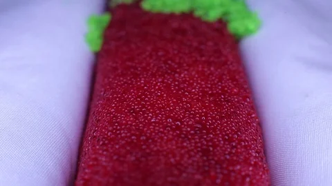 Green flying fish roe Stock Footage 82700898