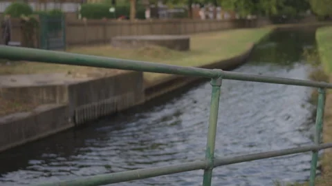 Green Footbridge Railing Rack Focus Over Narrow Canal Stock Footage 341473128