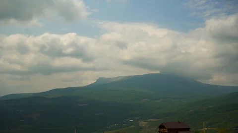 Green Forest Mountain and Cloudy Sky Panorama Stock Footage 115150886