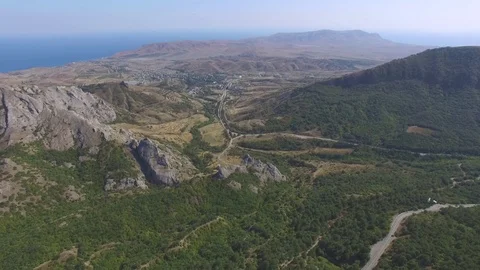 Green forest on mountain ridges, aerial view Video stock 80986105