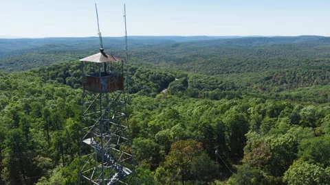 Green Forests Surrounding Devil's Knob Lookout Tower In Arkansas, USA - Aerial Stock Footage 328071237