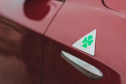 Green four leaf clover representing "quadrifoglio" in italian, sport division Stock Photos