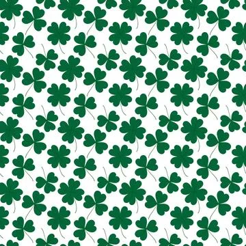 Green four leaf clovers and shamrocks Seamless pattern on white Repeating Stock Illustration