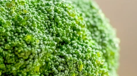 Green fresh broccoli in a closeup view as clean liquid water sprays over the  Stock Footage 62794498