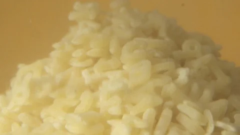 Green fresh broccoli in a closeup view as clean liquid water sprays over the Stock Footage 102585147